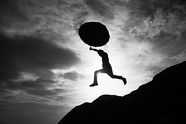silhouette-umbrella-jump-kerala.jpg